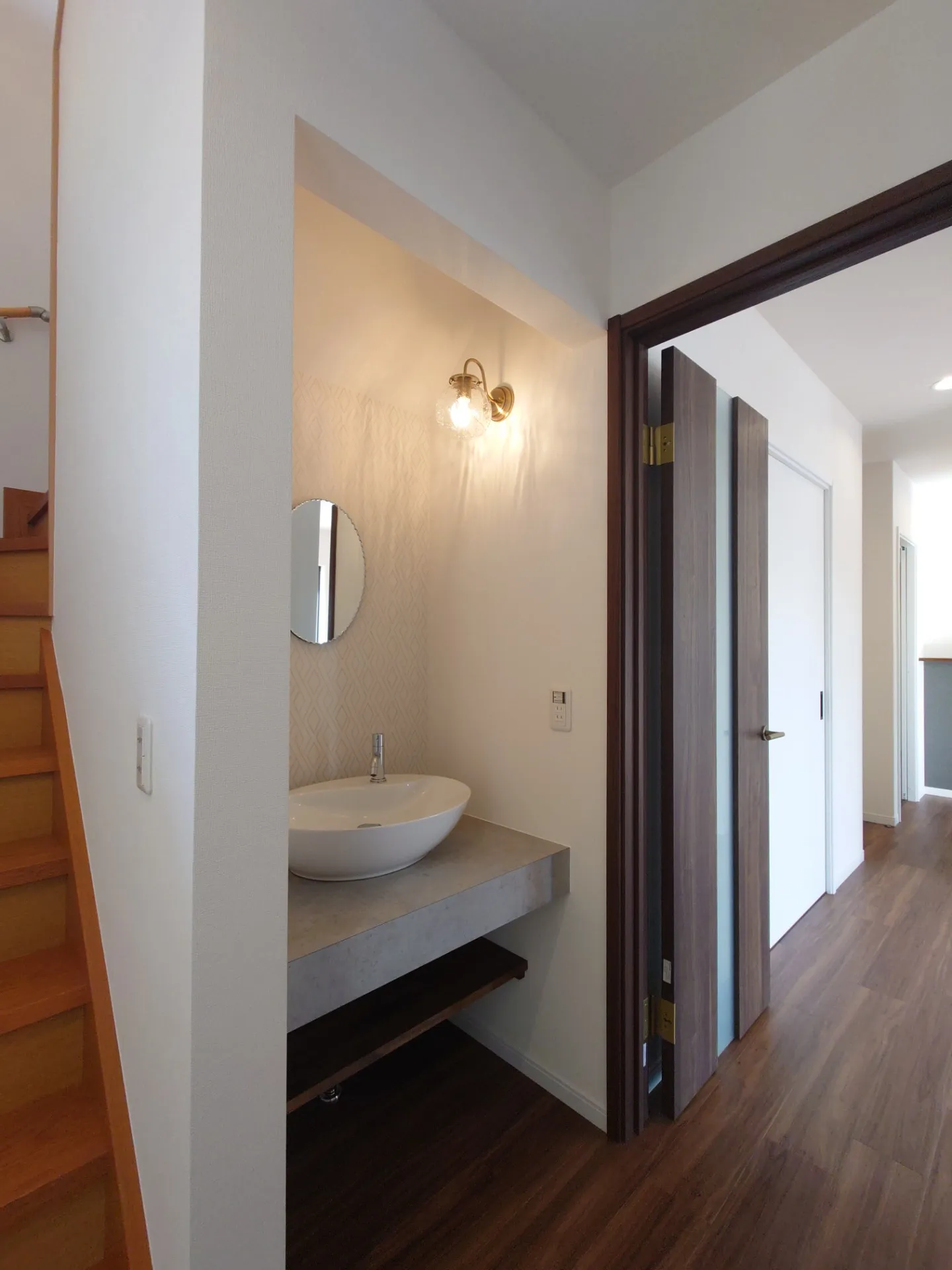 After　階段下収納→手洗いスペース